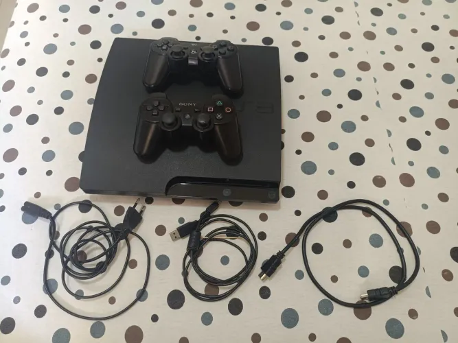 PS3,semi novo,2 controles, tudo certinho,contém mais de 20 jogos e 250 jogos de Nintendo