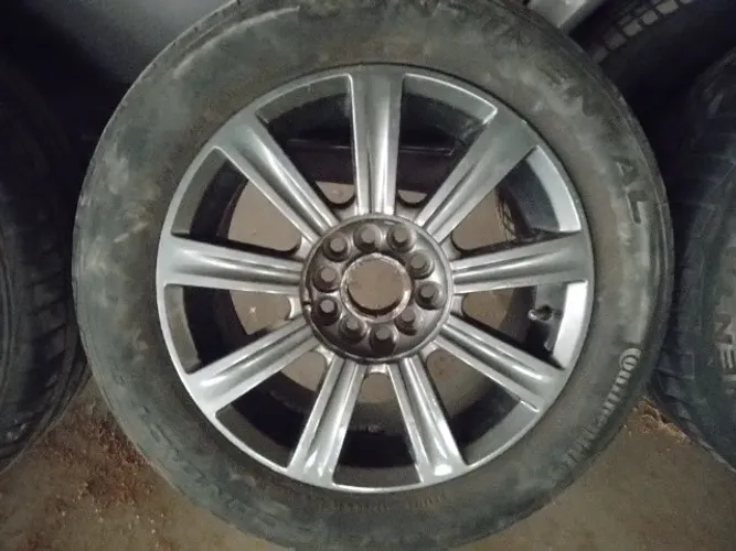 Rodas aro 15 multifuros com pneus meia vida.