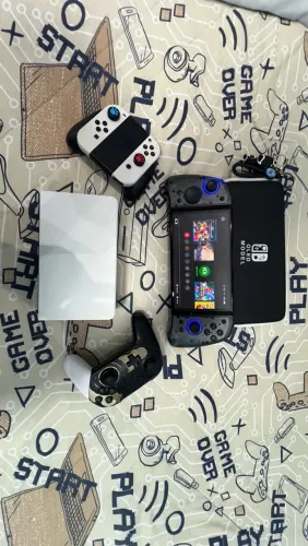 Nintendo switch oled desbloqueado com 3 controles