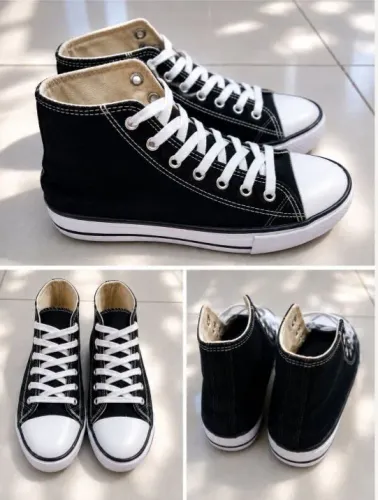 Tênis estilo All Star, modelo cano alto, na cor preta com branco.