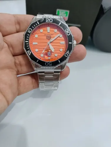 De...400,00..por..167,00..tagheuer.. aquarac
