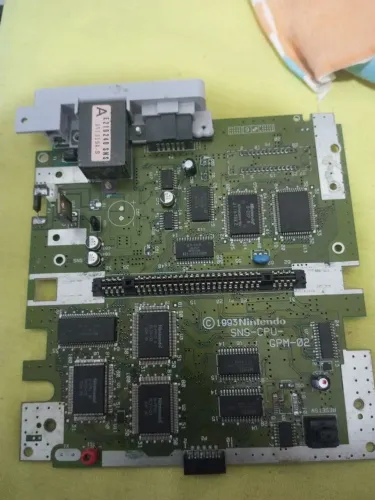 **Baixei** Placa Snes fat (praticamente todos componentes) p/ Peças ou reparo