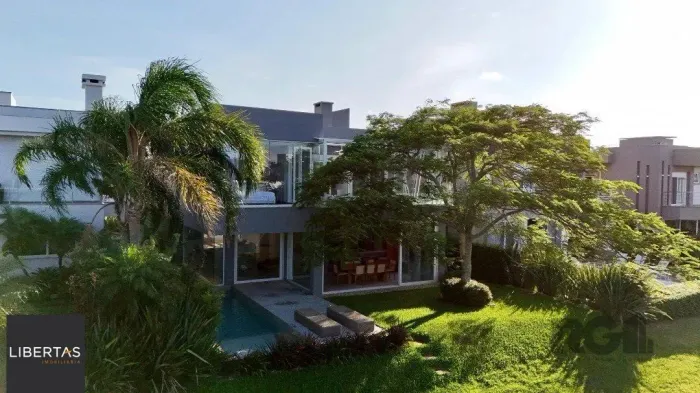 Casa de Condomínio em Atlântida Sul