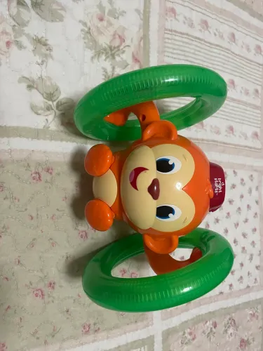 brinquedo infantil educativo - macaquinho rola e brilha - bright starts - brasbaby
