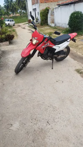 Moto de mulher, em perfeito estado