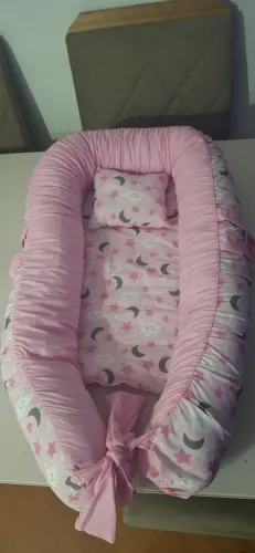 Ninho redutor bebê menina