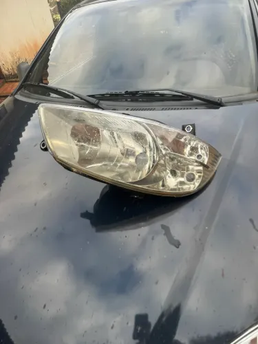 Farol original Fiat Strada 2014