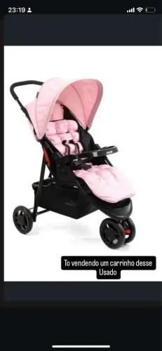 Carrinho de bebê rosa