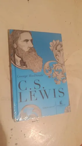 Livro George McDonald novo no plástico
