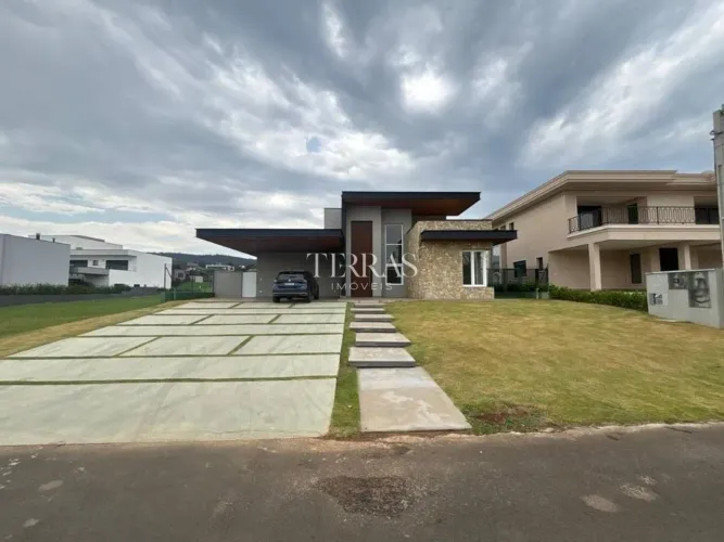 Casa com 4 dormitórios à venda, 398 m² por R$ 4.400.000 - Condomínio Portal Japy Golf Club