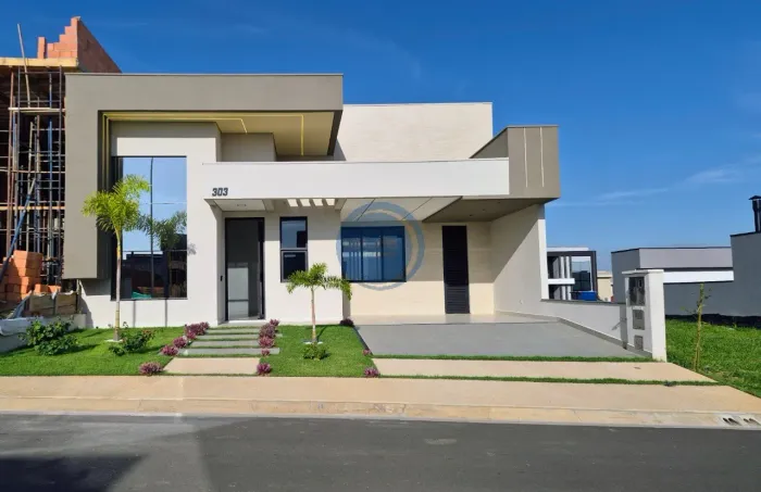 Casa de luxo em condomínio: 3 quartos, 3 suítes, 2 salas, 5 banheiros, 4 vagas de garagem