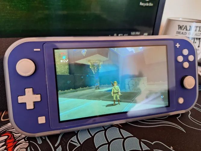 Nintendo Switch Lite Azul + Mario Odyssey + Zelda BOTW + Acessórios