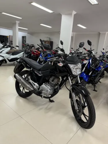 Fan 150 2015 super conservada