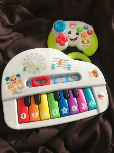 Piano e controle infantil fisher price