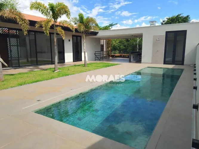 Casa em Condomínio Fechado com 5 suítes, 3 vagas à venda, a/c 511 m² por R$3.000.000,00 -