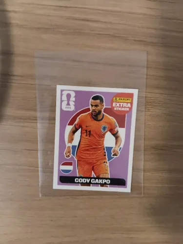 Figurinha legend do Gakpo na versão lilás