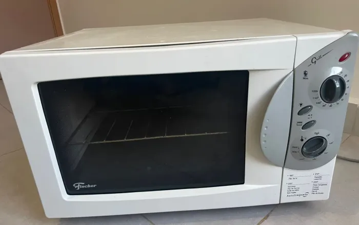 Vendo forno elétrico em ótimo estado proto pra uso bem conservado