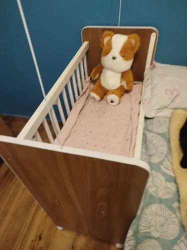 Berço Infantil com grade ajustável
