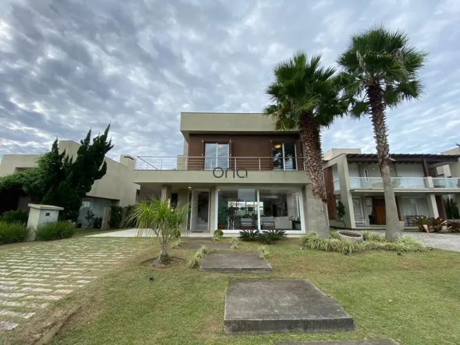 Casa mobiliada com 5 suítes à venda, 351 m² - Condomínio Ventura Club - Xangri-lá/RS REF:
