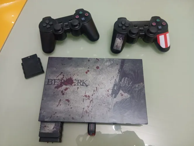 Vendo ps2 com vários jogos 