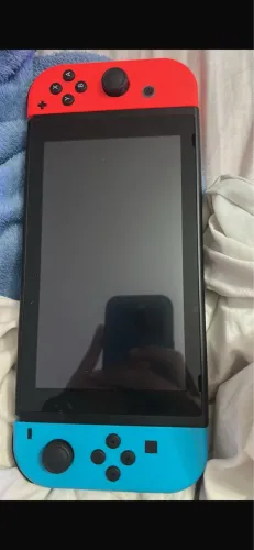 Nitendo Switch V2, completo, vai com cartão de memória. Ainda na garantia.