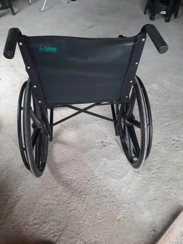Cadeira de roda.