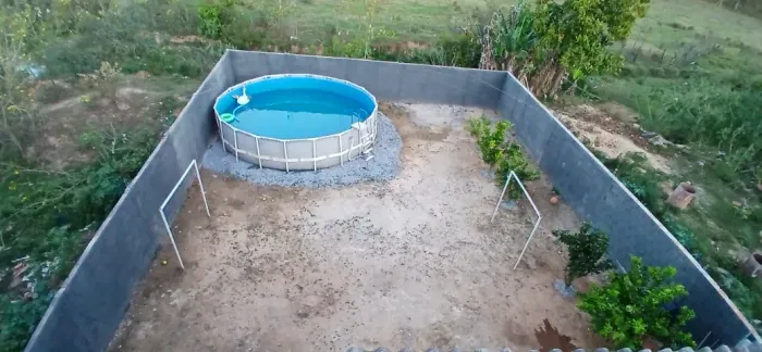 imovel com loja , casa e area de lazer