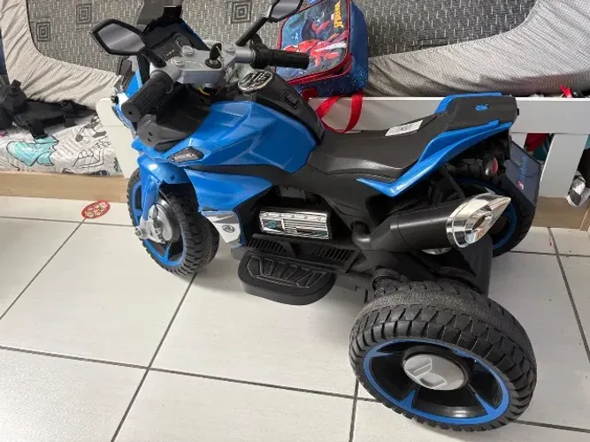 Moto elétrica bandeirantes 12v (com defeito)