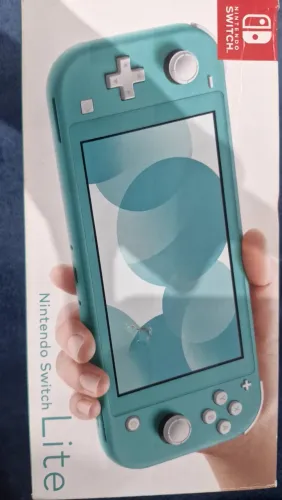 Nintendo Switch Lite Turquesa + Caixa + MicroSD 100 GB + Acessórios