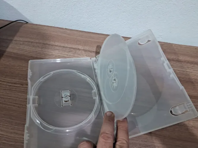 45 estojos para DVD novos + brinde