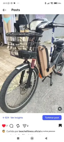 Bicicleta elétrica com cadeirinha pra criança 