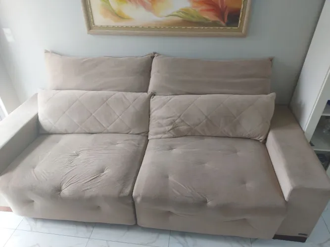 Sofá cama retrátil.