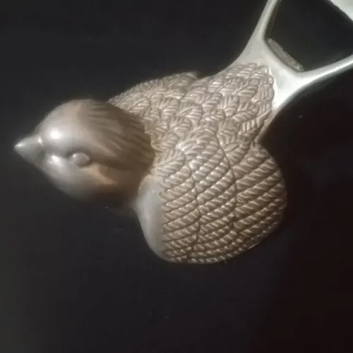 Abridor de garrafas antigo