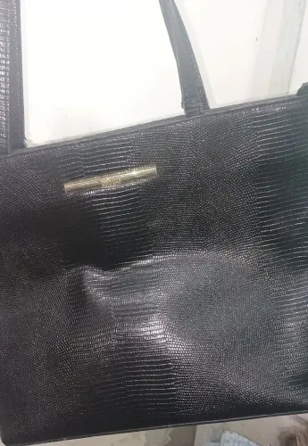 Bolsa tiracolo Santa Lolla semi nova veja fotos 