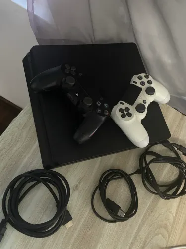 Vendo PS4 Slim + 2 controles + 11 jogos AAA