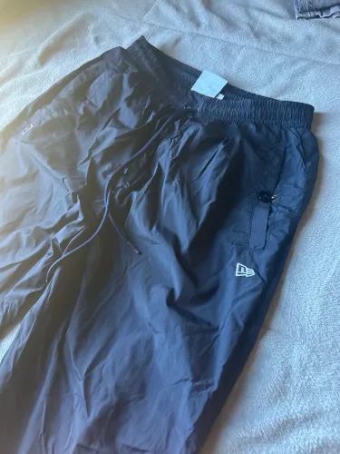 Calça new era azul escura