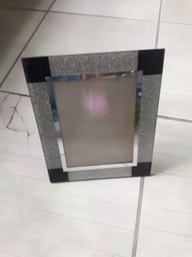 Este é um porta-retratos de vidro