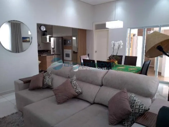 Casa com 5 dormitórios à venda, 300 m² por R$ 1.700.000,00 - Condomínio Athenas - Paulínia