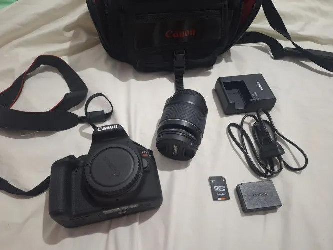 CANON T7+: PRATICAMENTE NOVA COM BOLSA DE TRANSPORTE E ALÇA