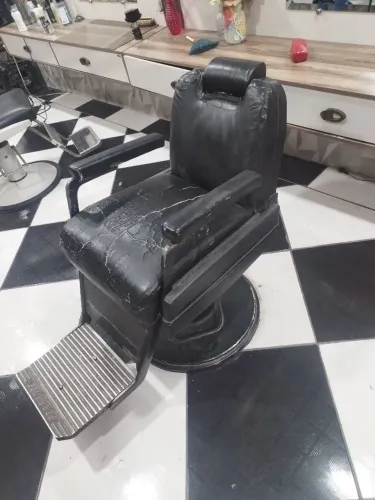 Antiga cadeira de barbeiro 
