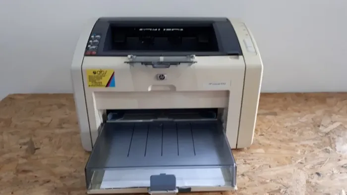 Impressora a laser HP 1022 em perfeito estado com um toner novo e garantia