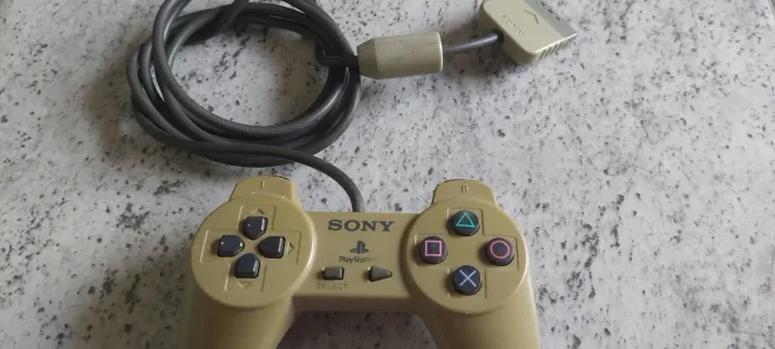 Manete controle Playstation ps1 original vídeo game antigo ñ super nintendo N64 SNES ps2