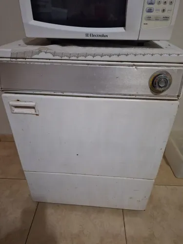 Máquina de secar roupa