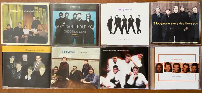 7 Singles BOYZONE + álbum ?Where we belong?