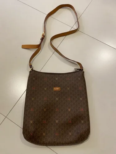 Bolsa alça tiracolo marca Victor Hugo