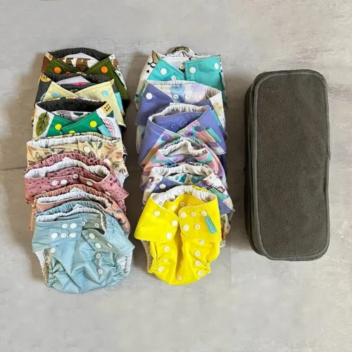 kit com 13 fraldas ecológicas - happy flute e bebês ecológicos + absorventes de carvão