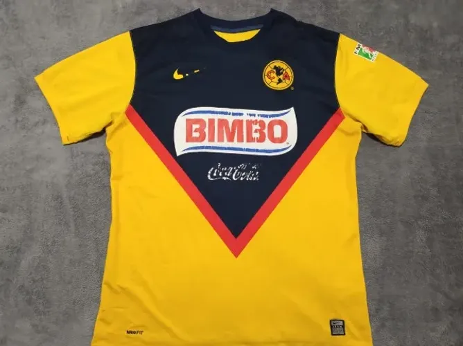 Camisa Oficial América do México Nike 2009, tamanho G (54x74cm).