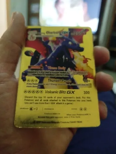 Carta pokémon GX Dourada do Charizard