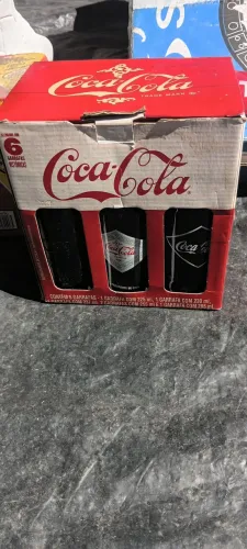 Vendo coleção de garrafas comemorativas retro da Coca cola