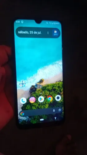 Celular  bom com apenas marca de uso 
